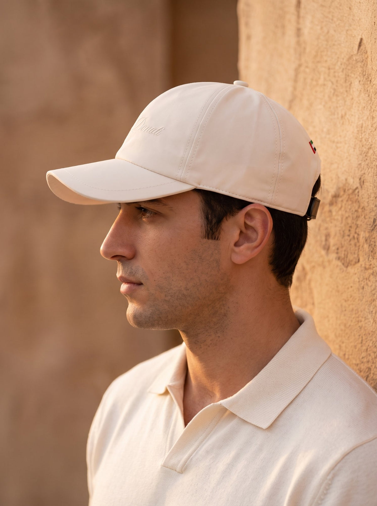 Profile portrait wearing the Dubai Limited Edition cap
